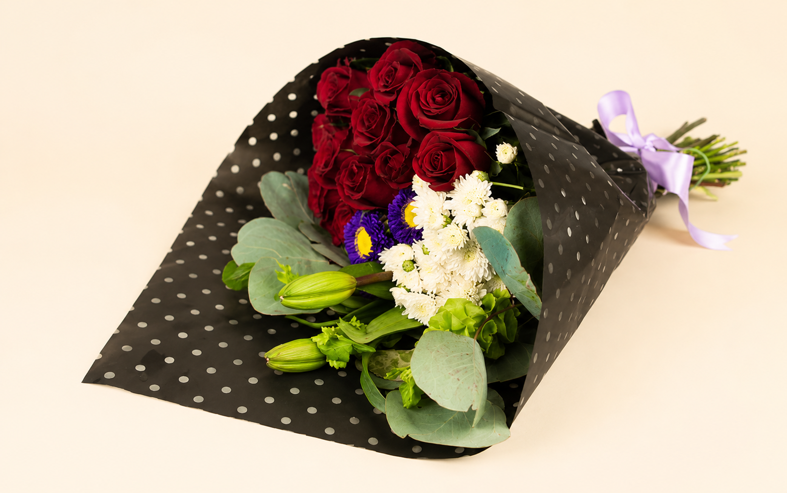 Bouquet 12 Rosas y dolar